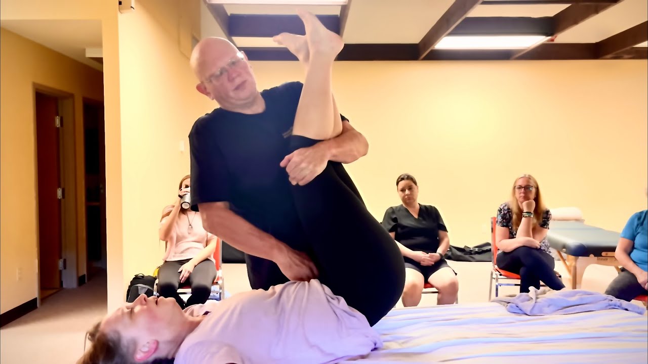 Abdominal massage. Getting to the core of tension and getting the tension out. Brandon working Amy 2