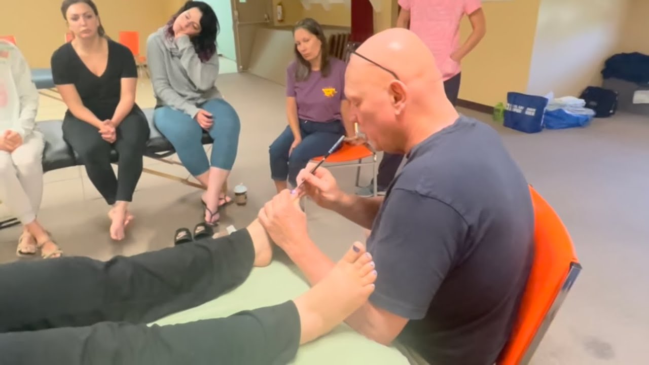 Foot reflexology massage. Deep big toe massage using chopsticks. Raynor Naturopathic Foot Massage 1