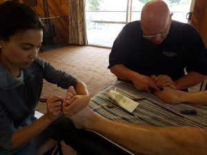 Brandon and Cori in New Zealand teaching Remedial Massage