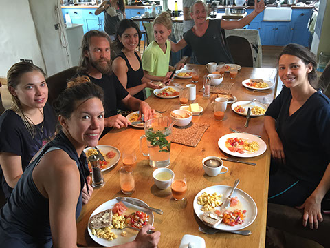 Friends sharing a meal at one of our massage courses.